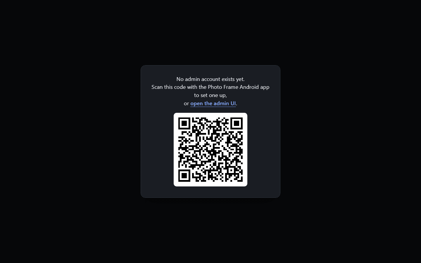 First-run kiosk screen with a QR code for pairing the Photo Frame Android app